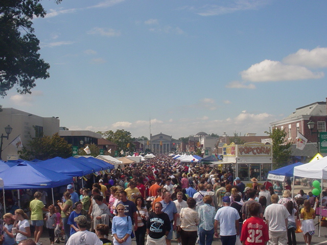 Overhead shot of citizens walking down Main Street